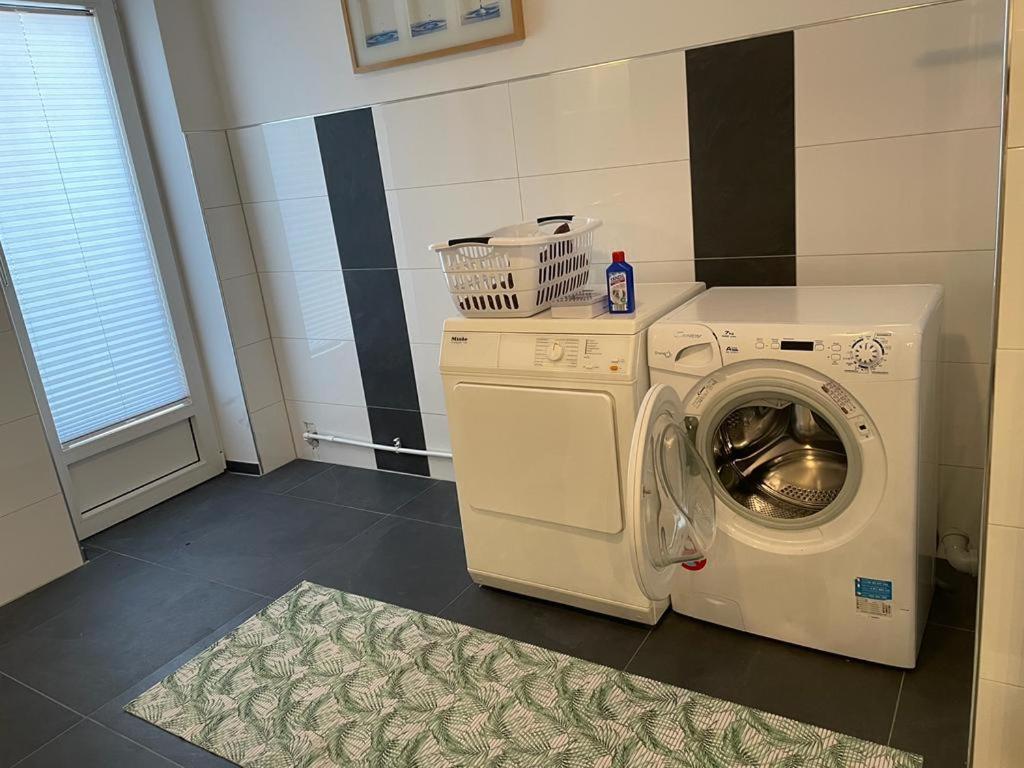 Ferienwohnung Lion Krummhörn Buitenkant foto