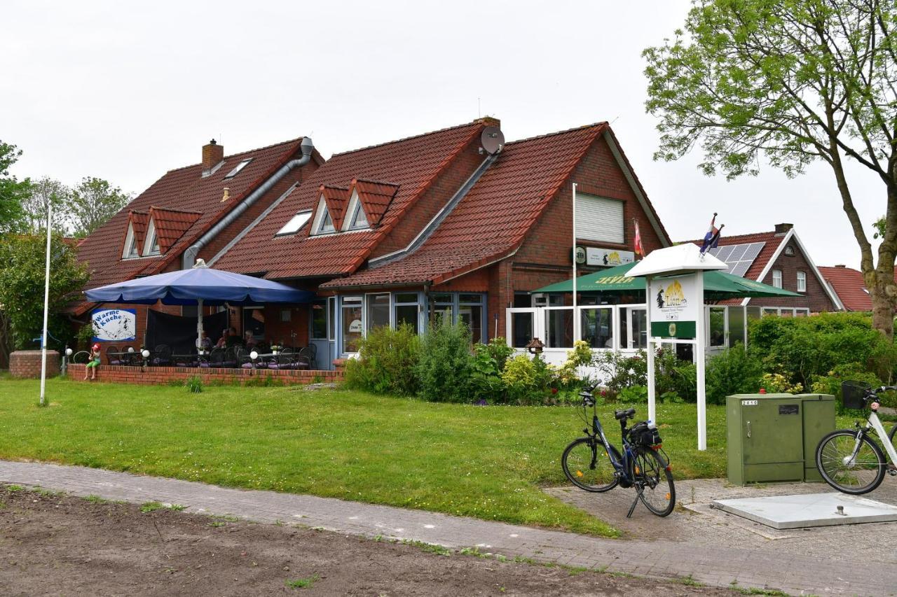 Ferienwohnung Lion Krummhörn Buitenkant foto